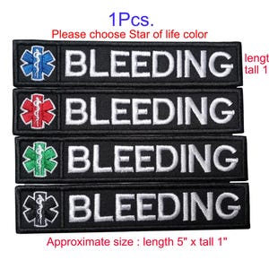 May include: Four rectangular black embroidered patches, each 5 inches long and 1 inch tall, featuring the white text BLEEDING and a Star of Life symbol in blue, red, green, or black. The patches have a black border and white stitching.