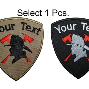 Pode incluir: Dois patches bordados com uma silhueta de bombeiro, machados cruzados e o texto "Your Text". Um patch é bege e o outro é preto.