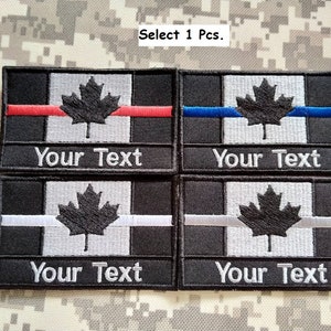 May include: Four embroidered patches featuring the Canadian flag with a thin red, blue, or white stripe across the middle. Each patch has a black background and the text "Your Text" below the flag.
