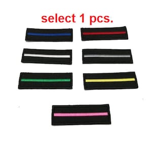 May include: Set of 7 thin black embroidered patches with a single coloured line in blue, red, white, green, yellow, pink and grey. Select 1 pcs.