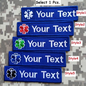 May include: Five blue embroidered patches with different styles of medical symbols and the text "Your Text". The text "Select 1 Pcs." is at the top of the image.