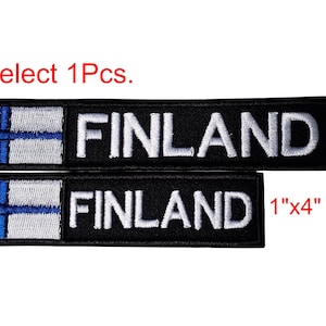 May include: Two black embroidered patches with the word "FINLAND" in white lettering. The top patch features the Finnish flag and measures 1 inch by 5 inches. The bottom patch measures 1 inch by 4 inches. Select 1Pcs.