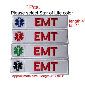 Puede incluir: Parches EMT blancos con un emblema de la Estrella de la Vida en azul, rojo, verde y negro. Cada parche tiene la palabra "EMT" en rojo. Los parches miden aproximadamente 10 cm de largo y 2,5 cm de alto.