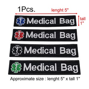 May include: Four black embroidered patches with white text that reads "Medical Bag". Each patch features a different coloured medical symbol: blue, red, green, and white. The patches are approximately 5 inches long and 1 inch tall.