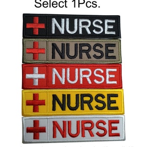 May include: Rectangular embroidered patches in black, brown, red, yellow, and white, each with a red cross and the word "NURSE" in white. Approximate size: 4 inches long x 1 inch tall.