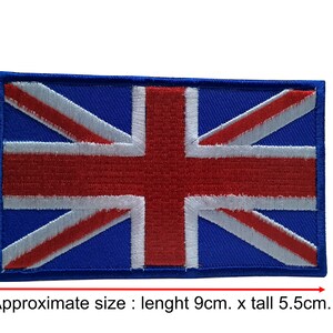 Könnte beinhalten: Ein blauer gestickter Aufnäher mit dem Design der Union Jack Flagge. Der Aufnäher ist etwa 9 cm lang und 5,5 cm hoch.