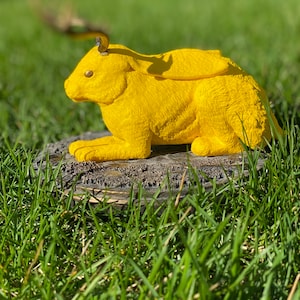 Jackalope statue in “catloaf” position (color)