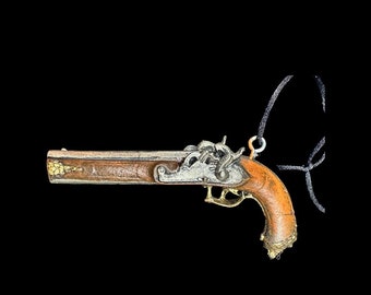 Flintlock pistol ornament