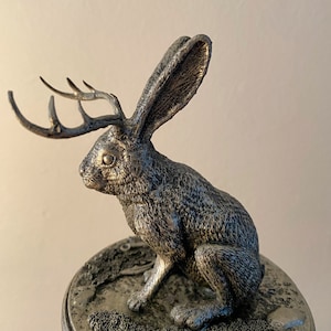 Seated jackalope mini statue