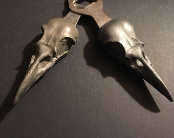 Crowpener, crow skull bottle opener.