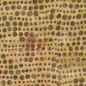 May include: A beige fabric with a repeating pattern of brown circles of varying sizes. The circles are slightly raised and have a textured appearance.