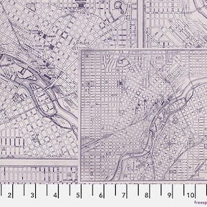 May include: A fabric with a detailed map design in shades of purple and white. The map features intricate street layouts, rivers, and labeled areas. The image includes a ruler with inch measurements along the bottom, and the text "Free Spirit Fabrics".