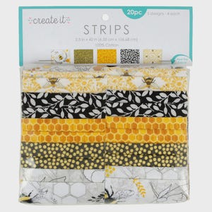 May include: A 20-piece set of 100% cotton fabric strips by create it, measuring 2.5 inches by 42 inches. The pack contains 5 designs featuring yellow, black, and white patterns with bees, honeycombs, leaves, and dots, all visible in the packaging.