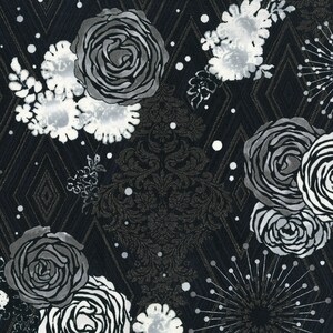 May include: Black and white floral fabric with a damask pattern and silver glitter accents. The fabric features a repeating pattern of roses and other flowers.