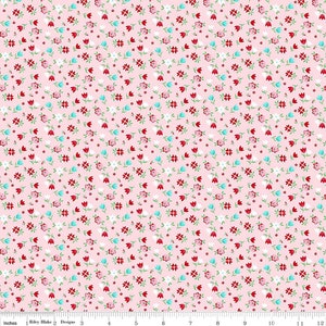 May include: A pink fabric with a repeating pattern of small red, white, and blue flowers. The fabric is perfect for quilting, crafting, and other sewing projects.