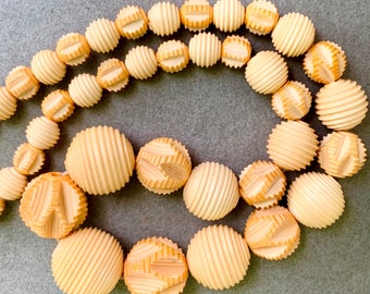 1930’s Carved Peach And Cream Galalith Necklace