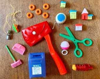 A Collection Of Little Vintage Plastic Toys