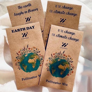 May include: Four seed packets with brown paper packaging. The packets have text that reads "the earth laughs in flowers", "BE THE CHANGE FOR climate change", and "EARTH DAY". Each packet features a globe illustration surrounded by flowers.