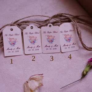 May include: Four brown paper gift tags with a watercolor illustration of a teacup and the text "The Perfect Blend" and "Mandy & Matt" with the date "09.30.2018".