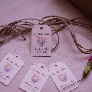 May include: Four beige gift tags with a brown twine string. Each tag has a watercolor illustration of a teacup and the text "The Perfect Blend" and "Mandy & Matt 09.30.2018".
