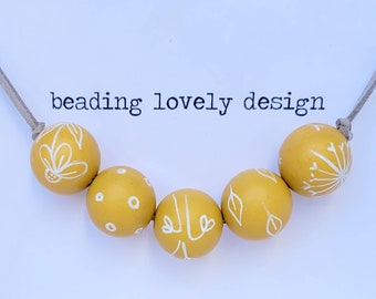 Hand-painted wooden bead necklace for women in mustard, costume jewellery, fun, colourful, unique.