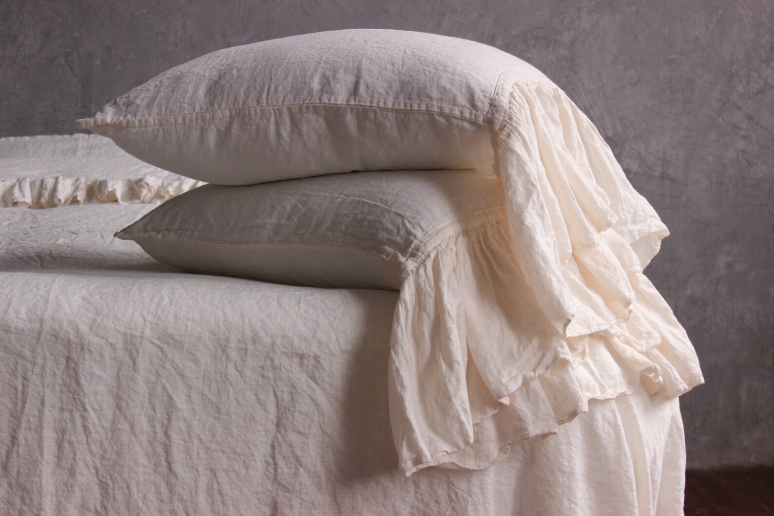 Stonewashed linen pillow sham with long ruffle on one side. Etsy