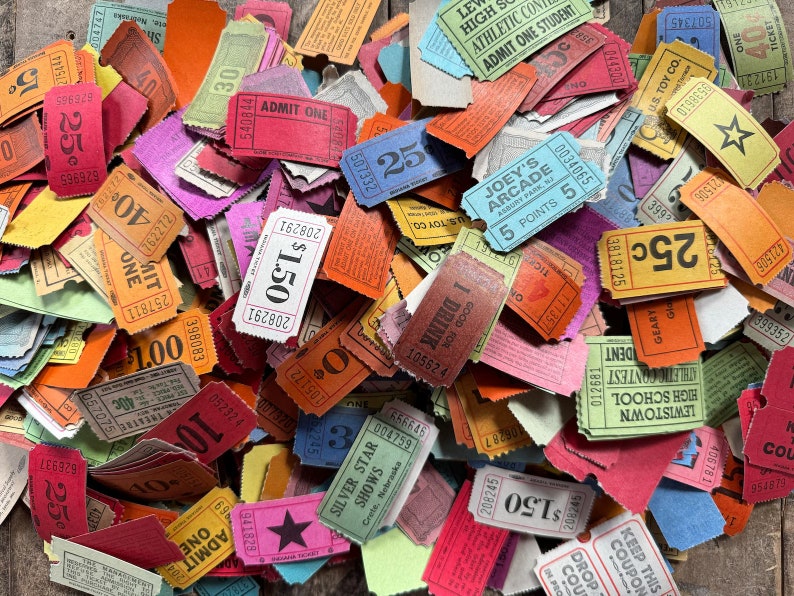 May include: A collection of colorful vintage paper tickets with various denominations and text, including "ADMIT ONE", "25c", "$1.50", "1 DRINK", "JOEY'S ARCADE", "5 POINTS 5", "HIGH SCHOOL ATHLETIC CONTEST", and "SILVER STAR SHOWS".
