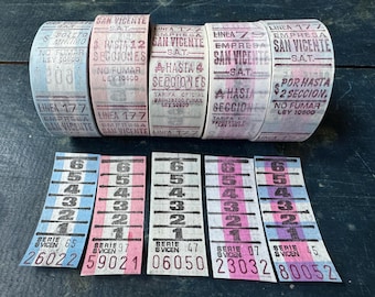May include: Five rolls of vintage bus tickets from Empresa San Vicente Linea 177, featuring various color-coded sections and printed text. Below the rolls are five individual tickets with numbered sections and unique serial numbers in blue and pink.