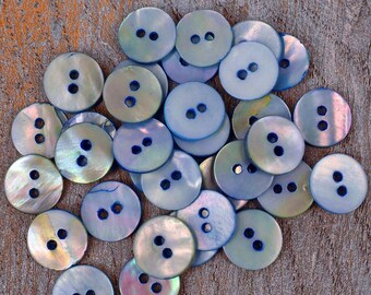 100 ASSORTED FISHEYE BABY GIRL BUTTONS SIZE 18-11MM.