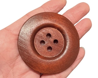 Giant dark brown wooden buttons: 6cm costume accessory (pack of 2)
