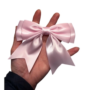 Pink baby bow: large 5-inch polyester ribbon bow with tails