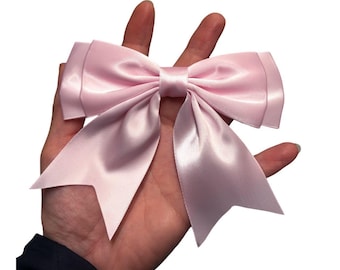 Pink baby bow: large 5-inch polyester ribbon bow with tails