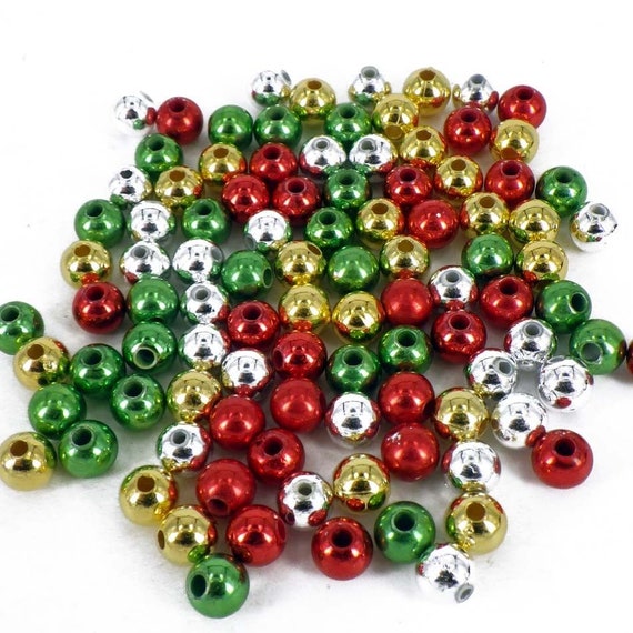 Jingle Bell Bracelet with red, green and silver seed beads. Gold