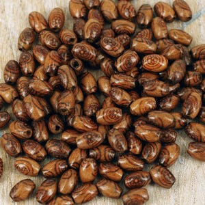Brown patterned wooden beads: oval craft supplies (120 pcs)