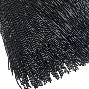May include: Black beaded fringe trim. The fringe is made of small, round beads that are strung together to create a long, flowing fringe. The fringe is perfect for adding a touch of elegance to any project.