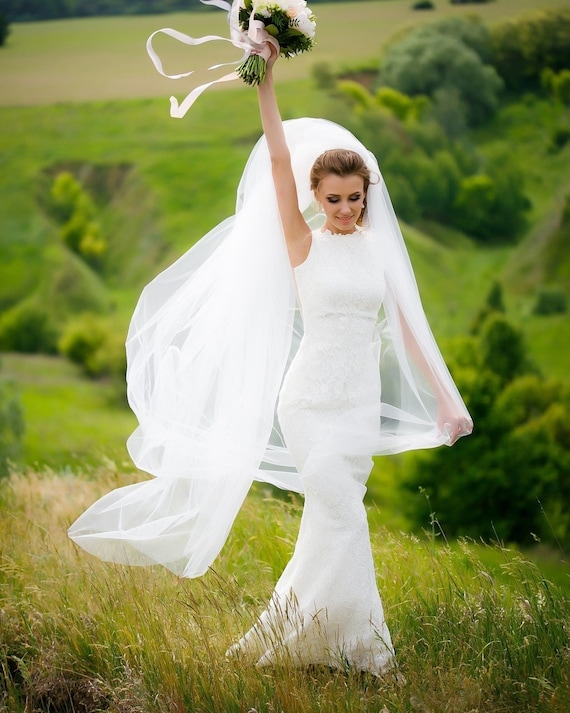 fitted lace wedding dress with open back