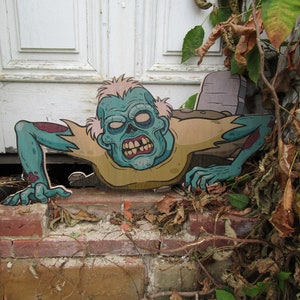 Zombie crawling from the ground scary happy Halloween yard decor great for trick or treat wood sign