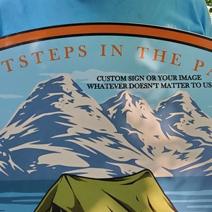 May include: A round, blue and orange sign with a mountain scene and the text "FOOTSTEPS IN THE PAST CUSTOM SIGN OR YOUR IMAGE WHATEVER DOESN'T MATTER TO US" and the name "Logan" at the bottom.