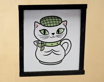 Teapot Cat Sign – Whimsical White Cat with Green Hat and Bow in Teapot Shape for Cute Cottage, Kitchen, or Eclectic Home Decor