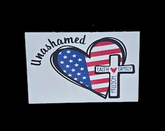 Unashamed Faith Family Freedom Sign – Weatherproof PVC Patriotic Heart and Cross Wall Art for Home or Event Display