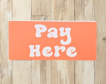 Pay Here Sign – Retro Orange and White Bubble Letter Sign for Small‑Business, Boutique, or Market Checkout Counter Decor