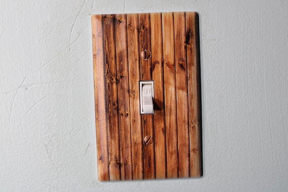 knotty pine pallet wood barnwood with warn painted paint chips light switch cover plate farmhouse decor rustic cedar