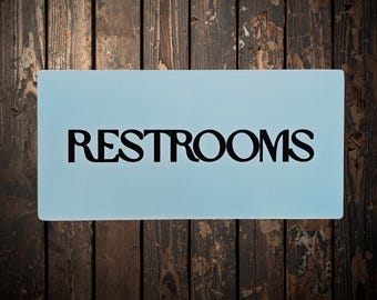 Rustic Restrooms Sign – Light Blue Bathroom Direction Sign on Distressed Wood for Farmhouse, Cottage, or Vintage‑Style Home or Business Use