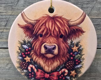 Festive Highland Cow Wearing a Wreath Printed Ceramic Ornament for the Tree