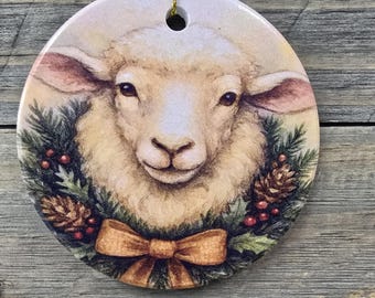 Festive Sheep wearing a Wreath Printed on a Ceramic Ornament for your Christmas Tree and Holiday Decor