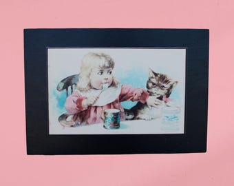 Vintage Child and Kitten Illustration Art Print – Charming Classic Scene with Spoon, Cup, and Warm Nostalgic Style for Cute Retro Wall Decor