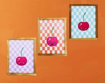 Set of Three Cute Cherry Face Art Prints – Retro Checkered Background Illustrations for Playful Kitchen, Kids’ Room, or Colorful Wall Decor