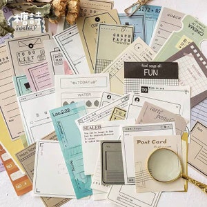 May include: Assortment of decorative paper stickers with various designs and text, including "To Do List", "Daily Plan", "Graph Paper", "Today", "Water", "Sealed", "Post Card", "Fun", and "Carte Postale".