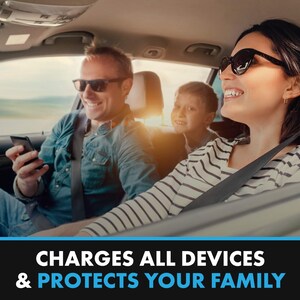 May include: A family of three in a car, the driver is looking at a phone, the passenger in the back is looking at the camera, and the front passenger is looking at the camera and smiling. The text on the image reads "CHARGES ALL DEVICES & PROTECTS YOUR FAMILY".