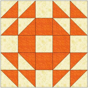 May include: A quilt block pattern with a central orange square surrounded by a ring of orange triangles. The background is a light yellow with a subtle floral pattern.